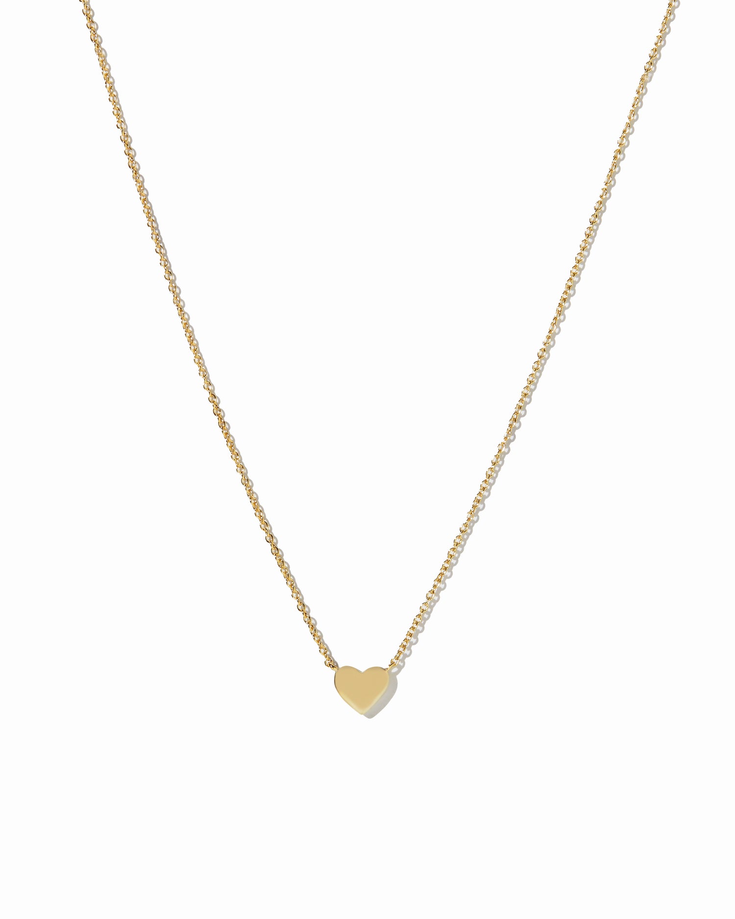 Heart pendant necklace on white background 