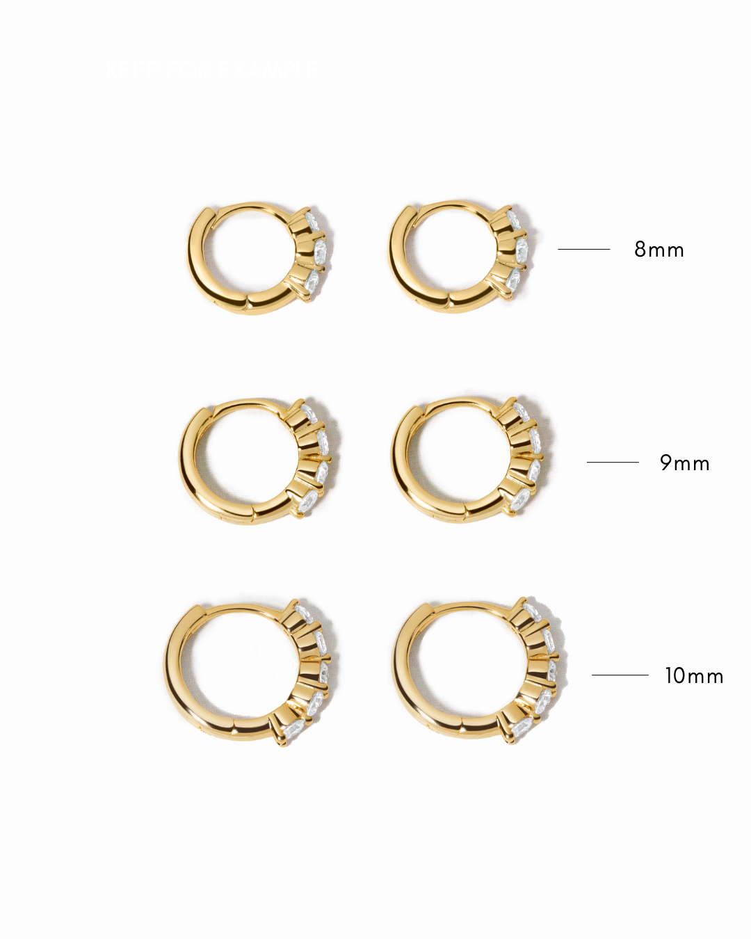 Set of gold hoop earrings with measurements on a white background