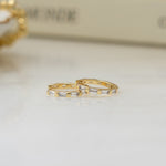 gold minimalist earrings with baguette cubic zirconia diamonds 