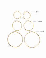 infographic image of three pairs of lightweight hoop earrings in gold, showcasing our 30mm size, 40mm size or 60mm size