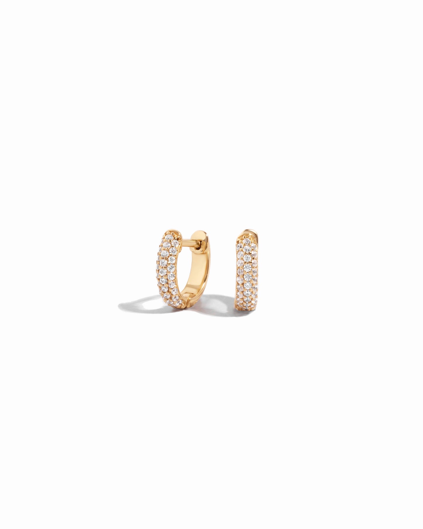 small hoop earrings featuring gold huggie hoop design 