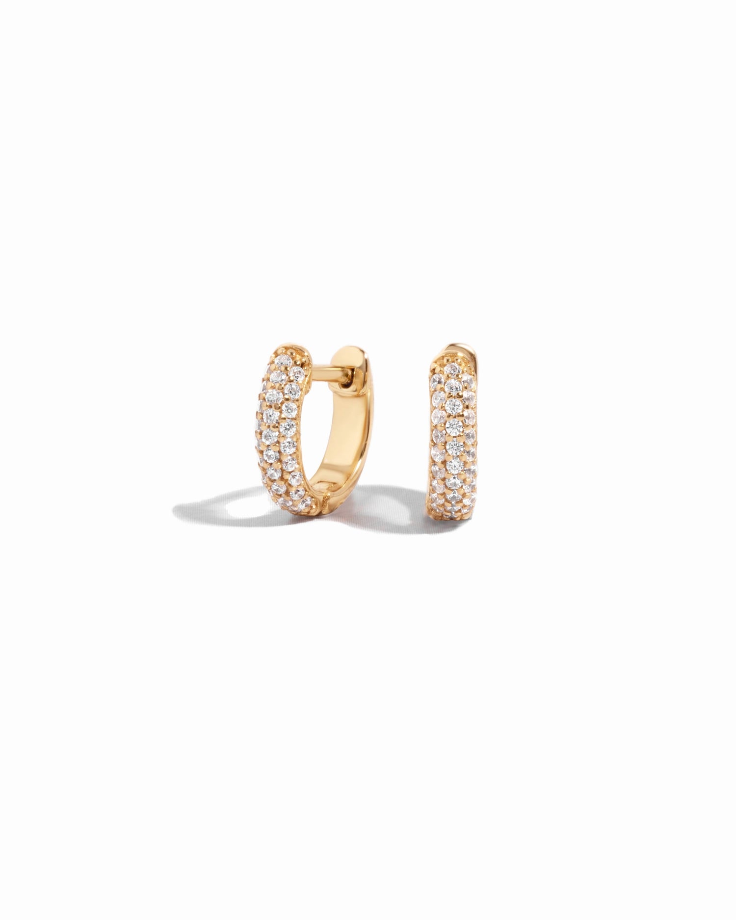 small hoop earrings featuring gold huggie hoop design 