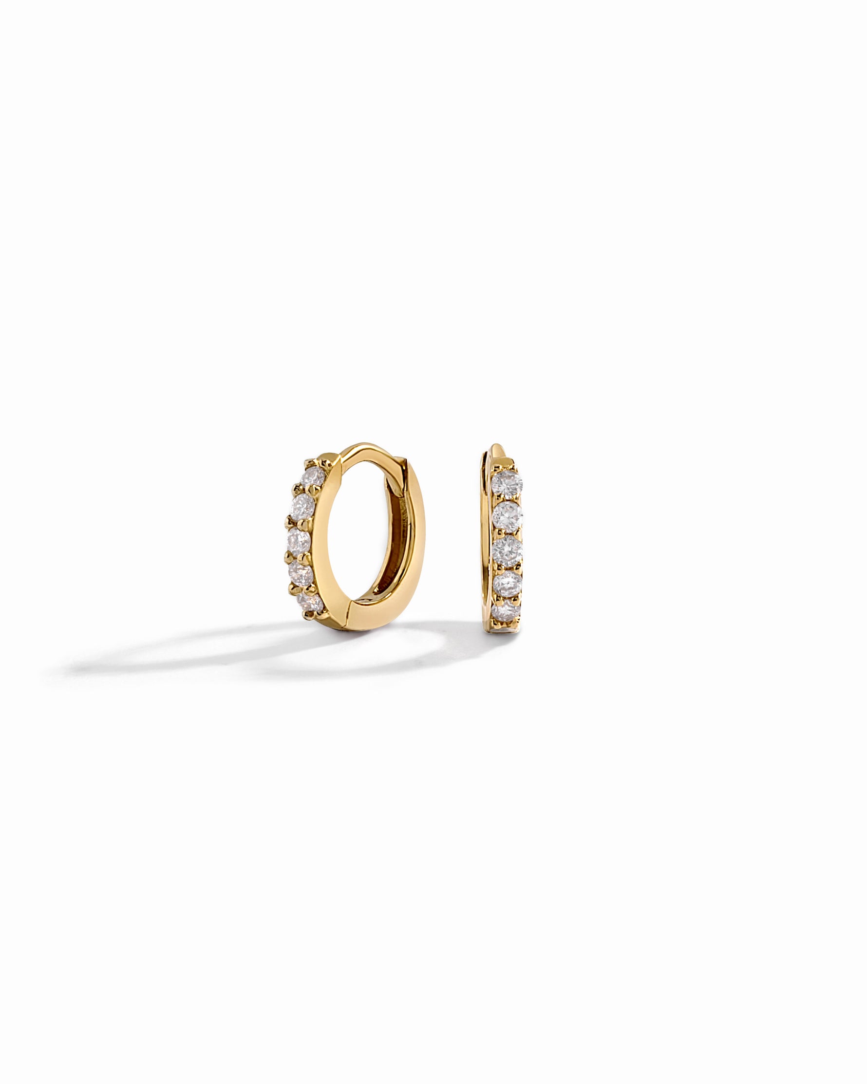 gold mini hoop earrings with cubic zirconia stones