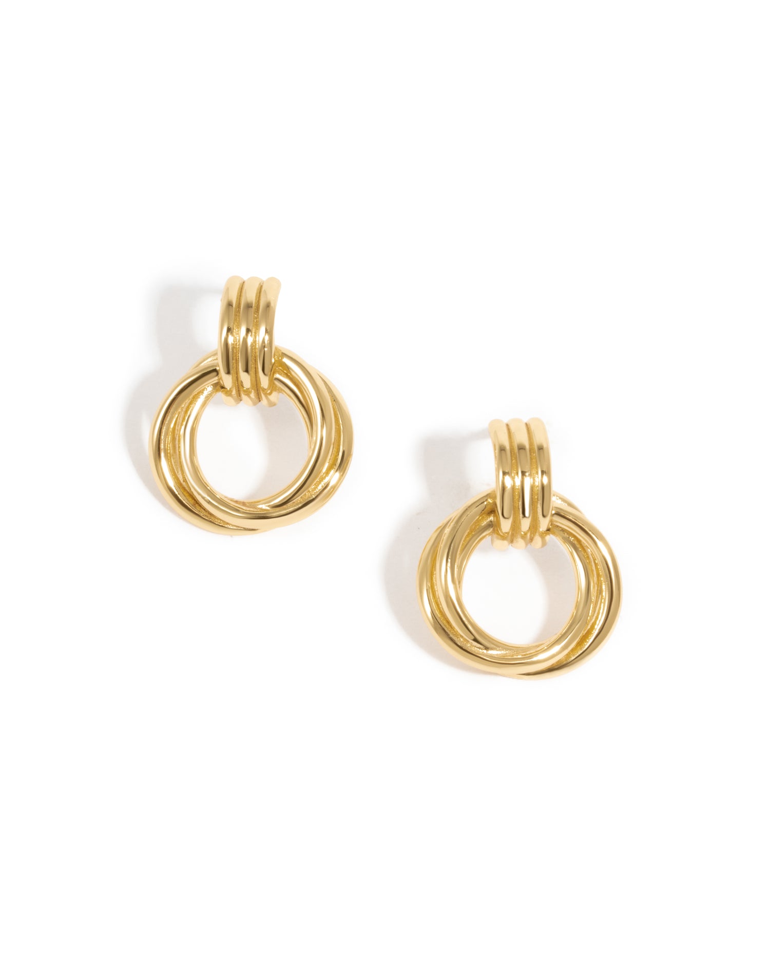 Close-up of Knot Hoop Earrings in gold, featuring a smooth, intertwined knot design.