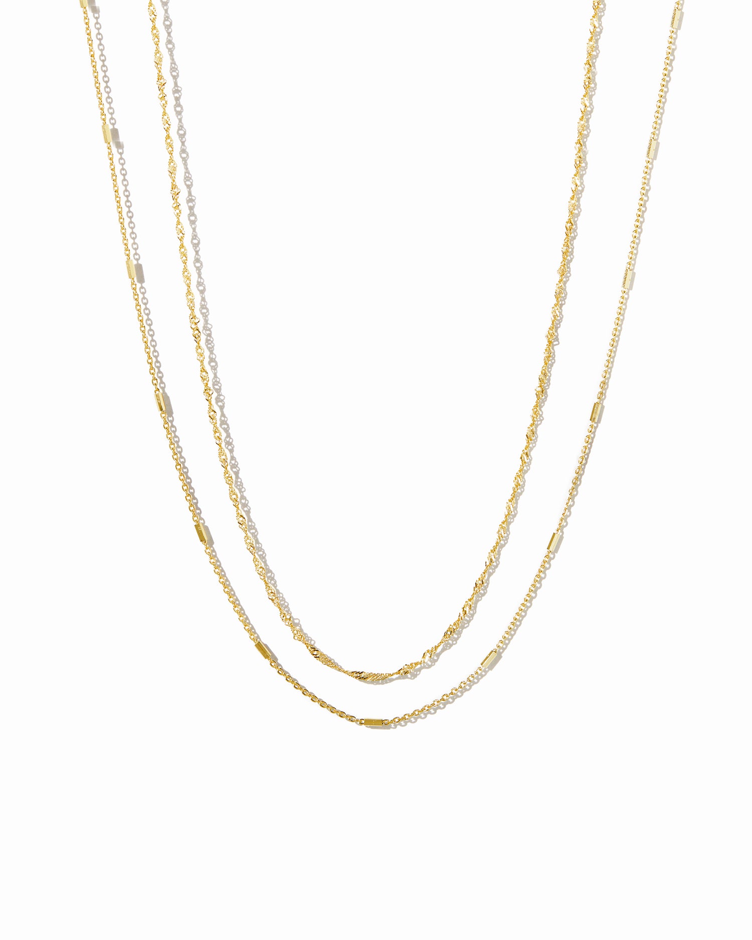dainty layering necklace set in gold