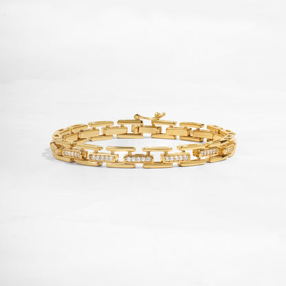 closeup of gold chain link bracelet