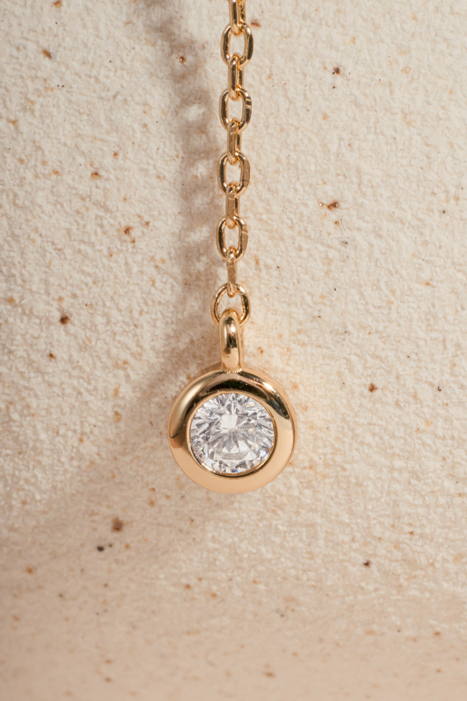 Gold Sami Jewels Bezel Lariat Necklace with long drop Y design, featuring elegant chain and pendant detail.
