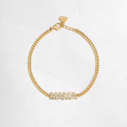 Closeup image of MAMA chain bracelet in gold