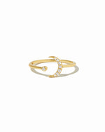 gold open moon ring on a white background