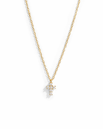 Gold necklace with a small cross pendant 