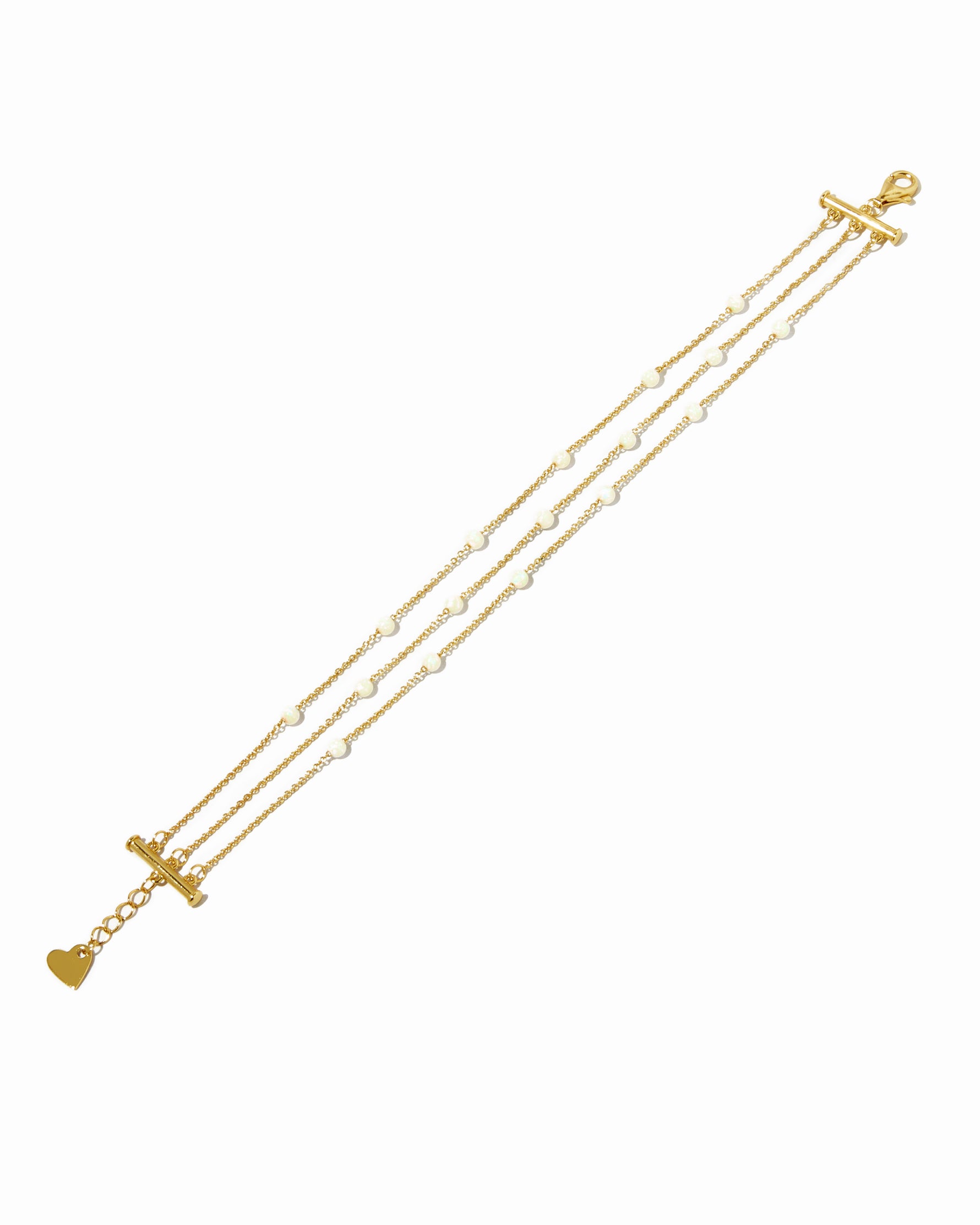 Gold opal stackable bracelet set on white background