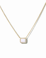 Gold necklace with rectangle opal pendant on white background