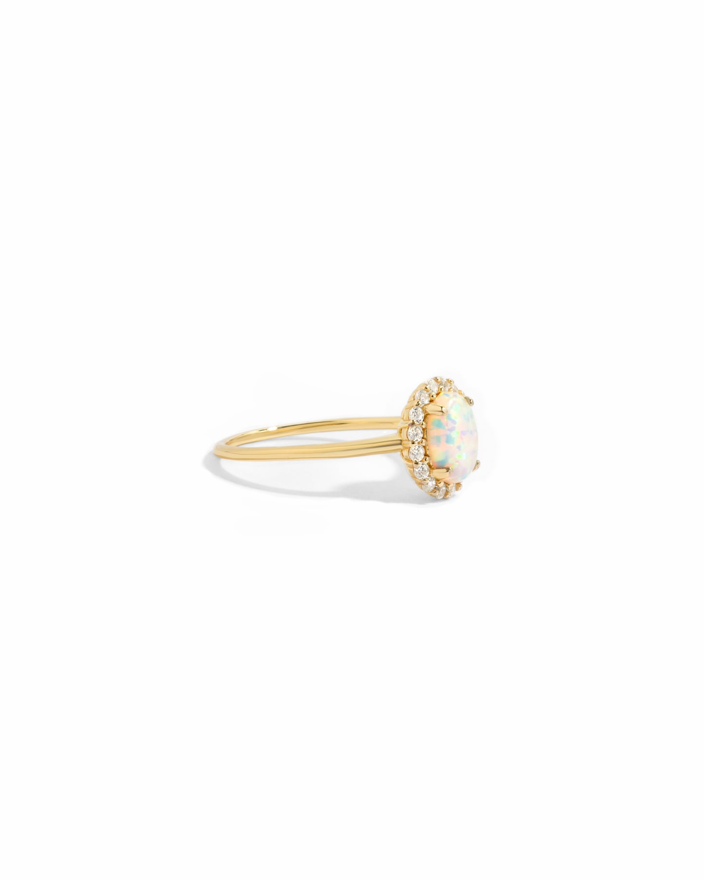 side view of solitaire oval opal ring with cz diamonds 
