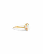 side view of solitaire oval opal ring with cz diamonds 