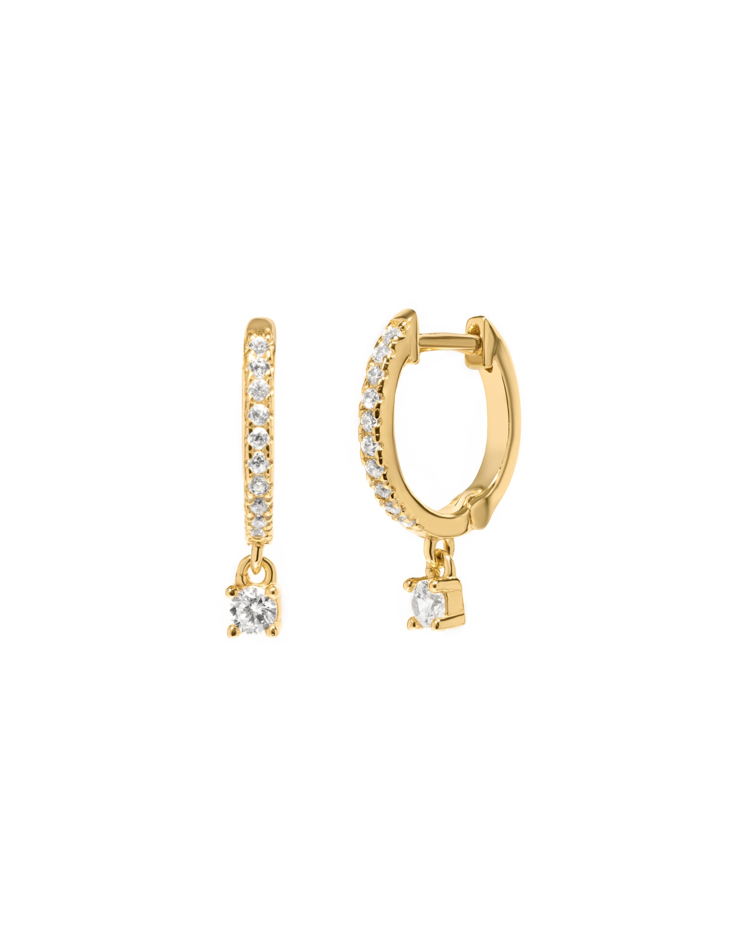 Gold pave hoop earrings with a diamond charm on a white background