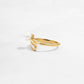 side view of 14k gold plated ring with wrap ring design, with freshwater pearl and baguette diamonds