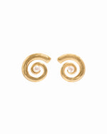 closeup image of gold and pearl earrings