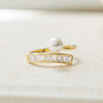 gold statement ring with wrap ring design and freshwater pearls