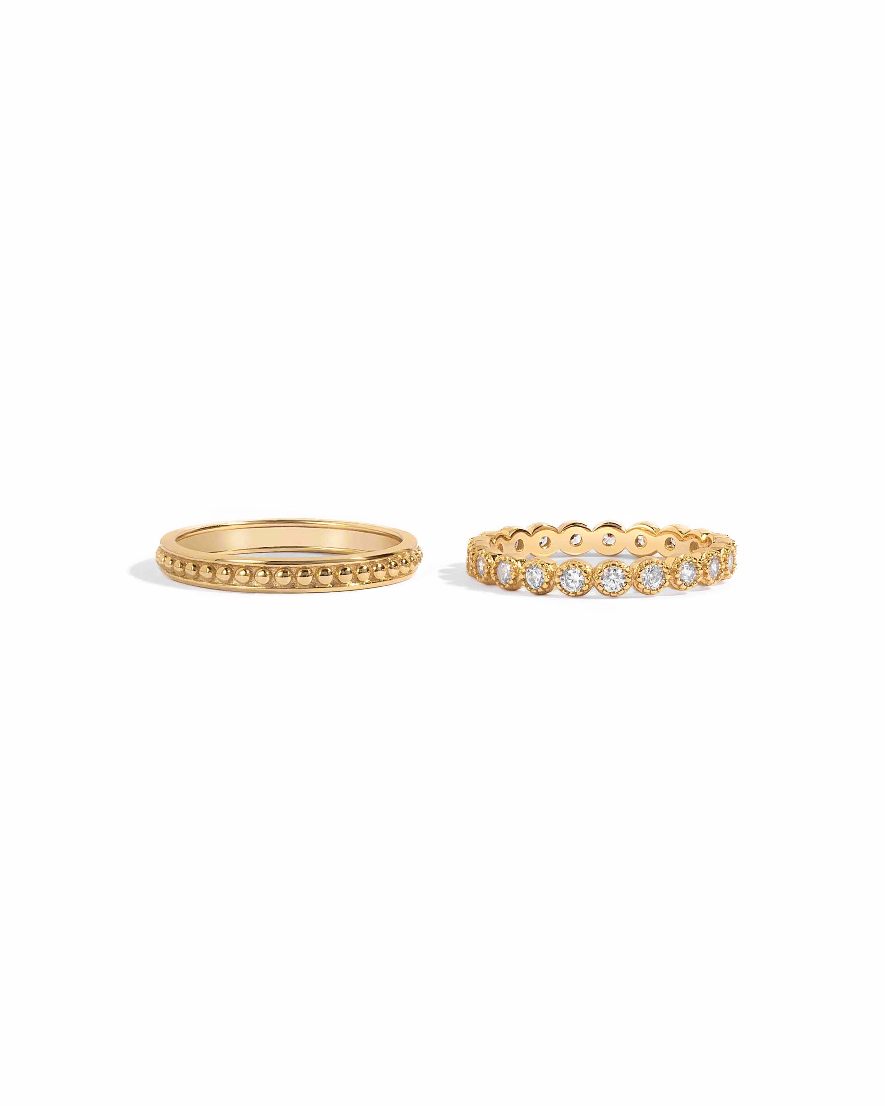 gold stacking ring set with cz diamonds, and plain band set