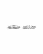 silver stacking ring set, one with a dainty beaded design and one with a studded bezel set cubic zirconia stone
