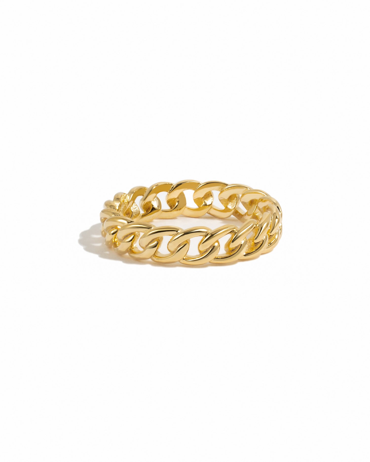 Gold chain-link ring on a white background