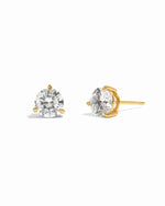 Gold stud earrings with round solitaire gemstones on a white background