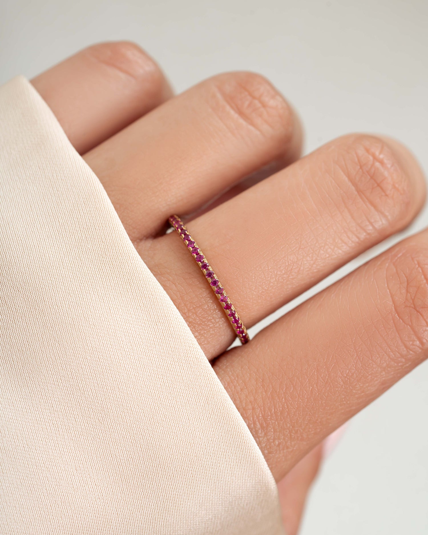 Gold ruby gemstone ring on model