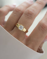 Chunky gold stackable ring on models hand