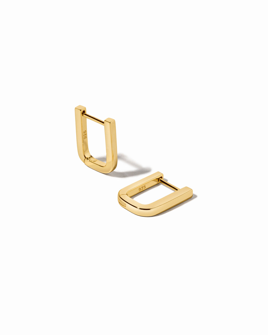 Gold square hoop earrings on a white background