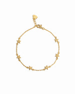 closeup image of gold star charm bracelet