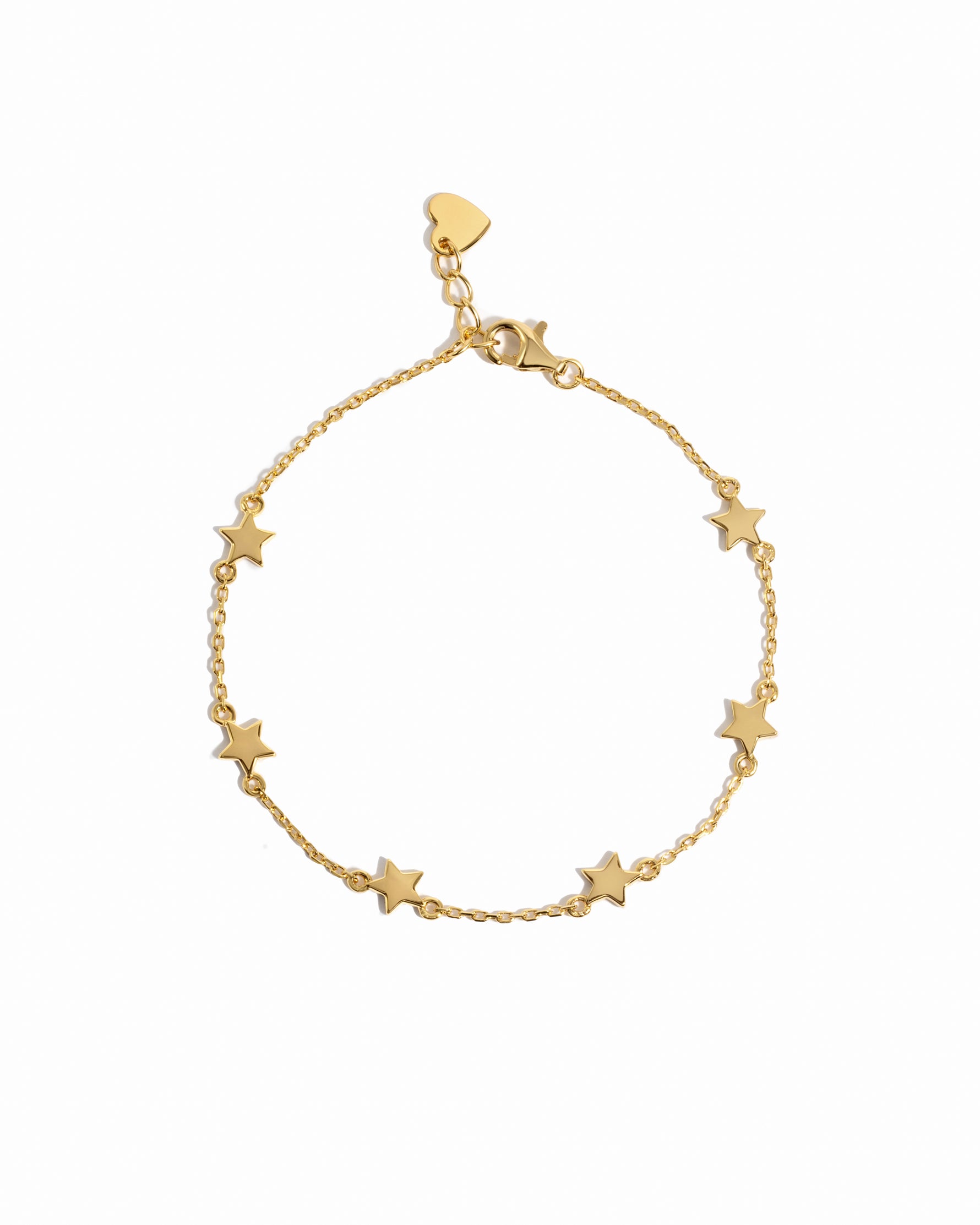 closeup image of gold star charm bracelet