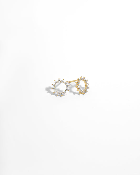 pair of gold sunburst diamond stud earrings