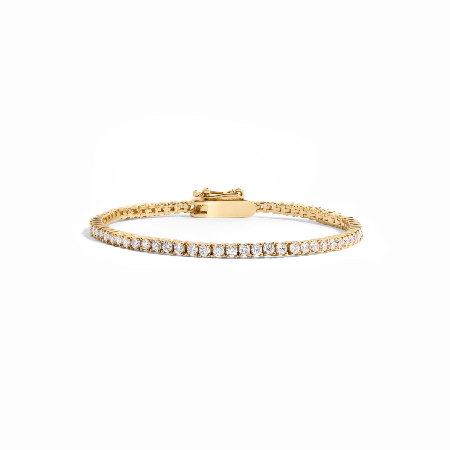 gold tennis bracelet with latch clasp
