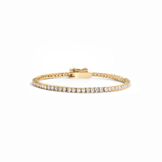 gold tennis bracelet with latch clasp