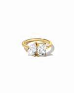 gold pear-cut and emerald-cut diamond ring