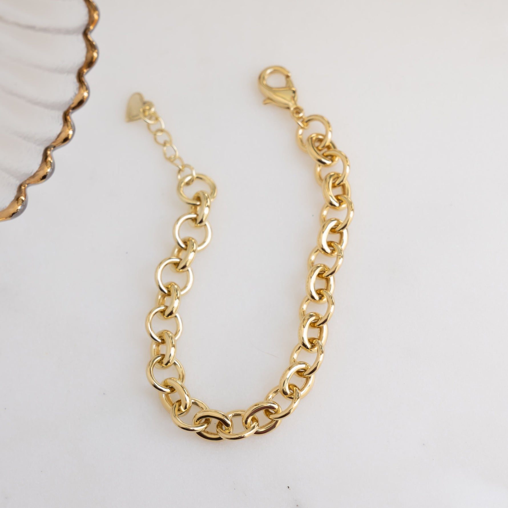 Flatlay image of gold chain bracelet
