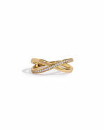 close up of gold wedding band with an X design