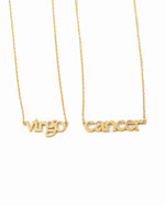 Gold necklaces with 'Virgo' and 'Cancer' writing on a white background