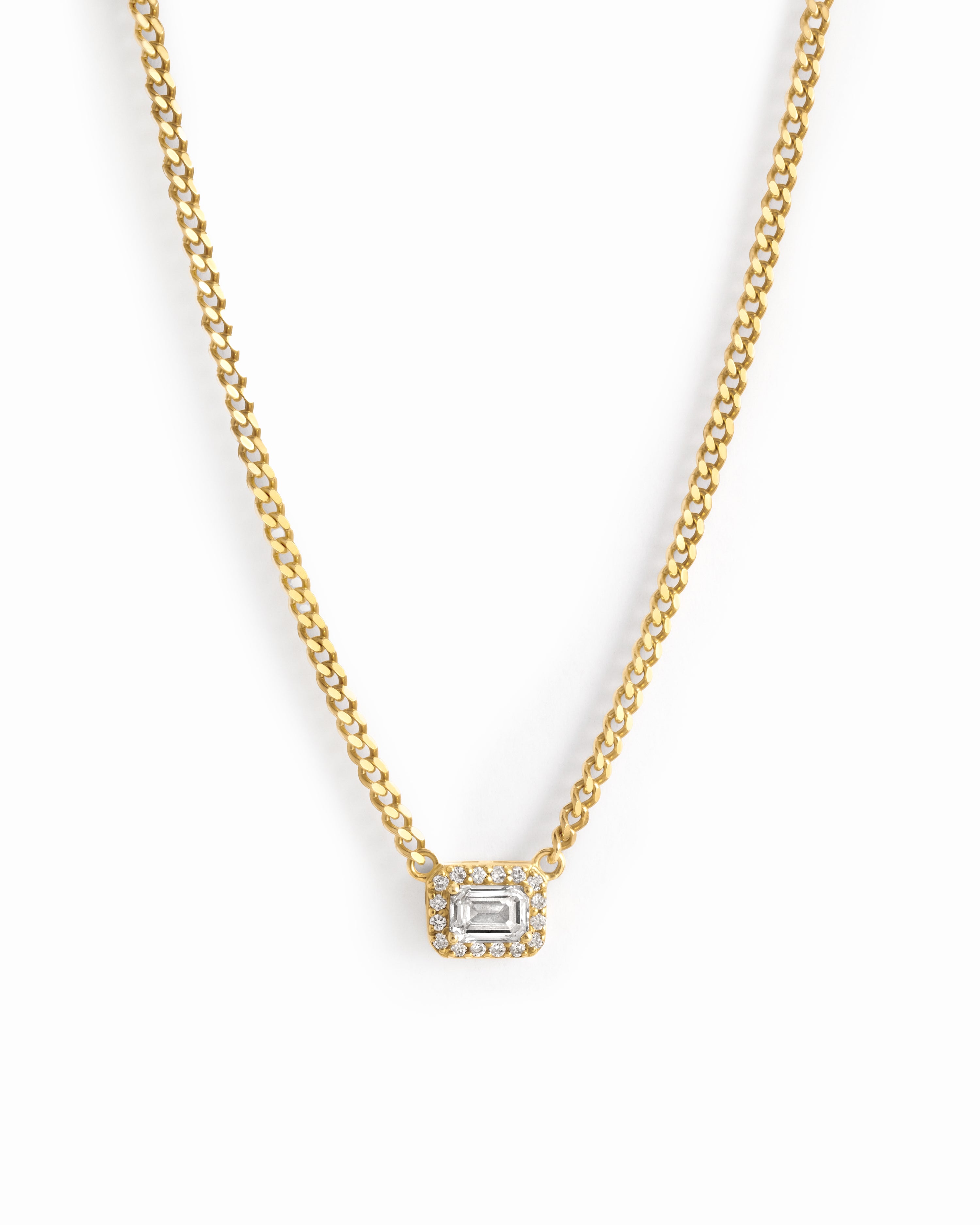 Sami Jewels halo emerald cut necklace on a Cuban chain, showcasing a sparkling gemstone pendant and elegant jewelry design.
