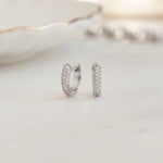 image of small silver huggie hoop earrings