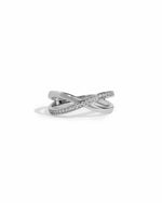 Close-up of a silver cross ring
