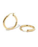 Lightweight chunky hoop earrings, classic madison beer hoop earrings on white backround