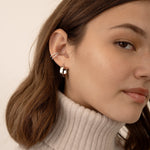 model wearing marcella double row earring cuff with cz stones and a minimalist silver hoop