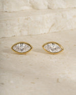 Pair of gold diamond earrings, perfect for bridal jewelry