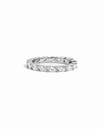 flat lay of minimalist ring as a wedding band alternative that offers timeless elegance with a modern marquise twist, set in sterling silver. 