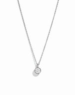 Sterling silver chain necklace with a bezel set diamond pendant