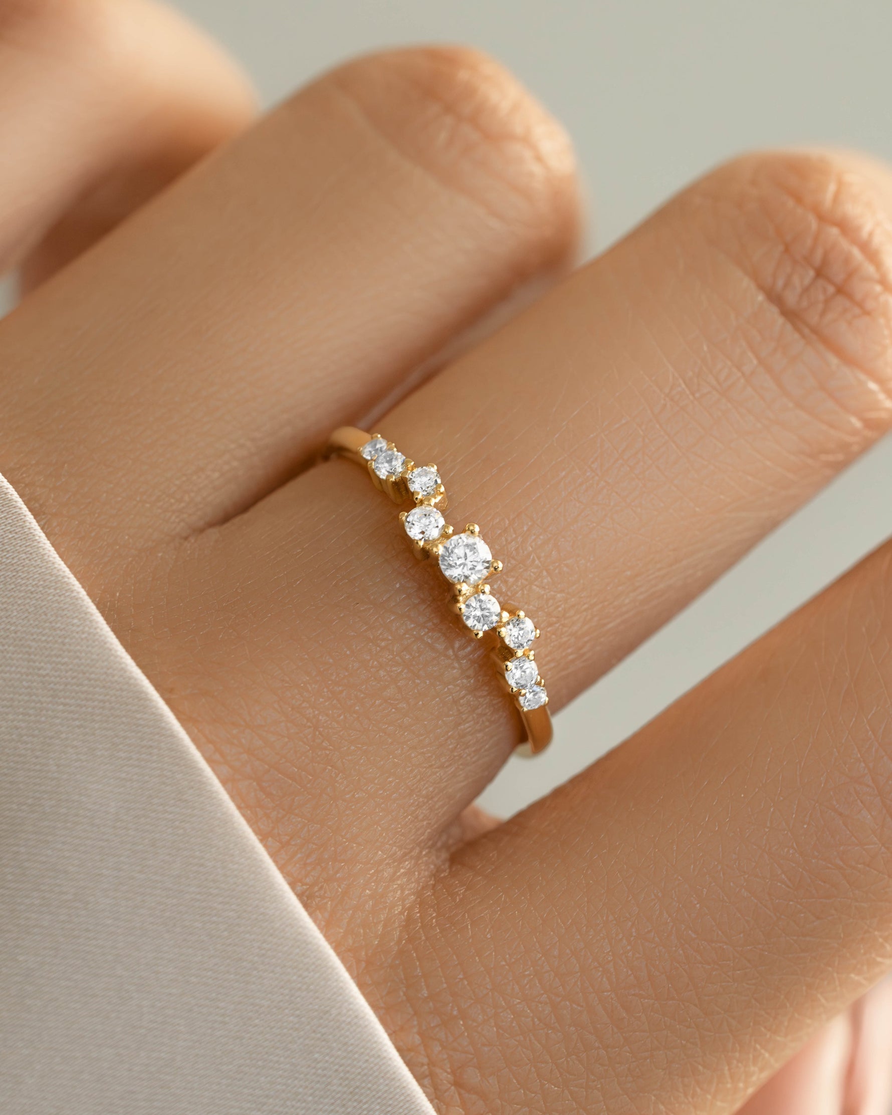 Gold promise ring on model