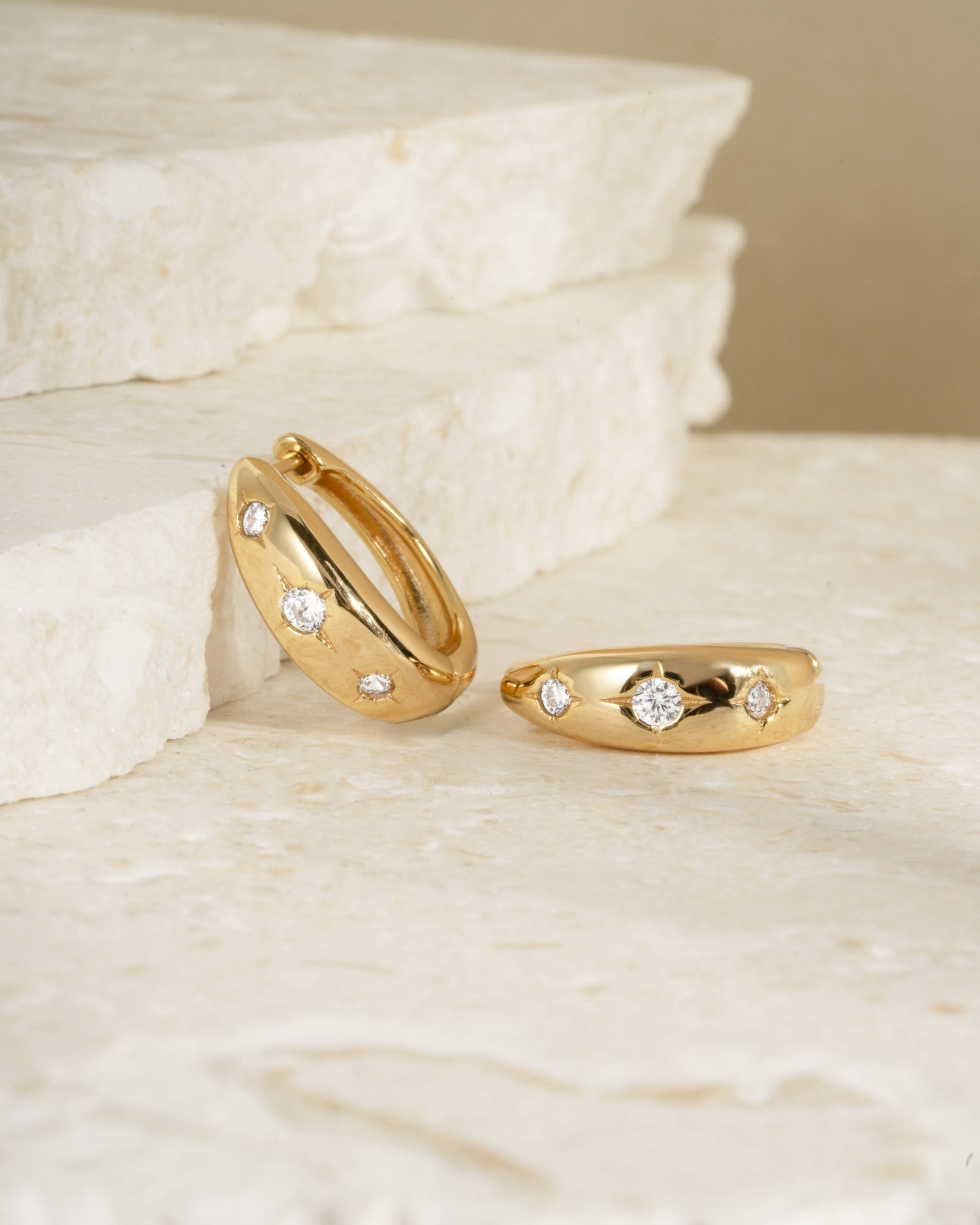 Gold celestial hoop starburst earrings