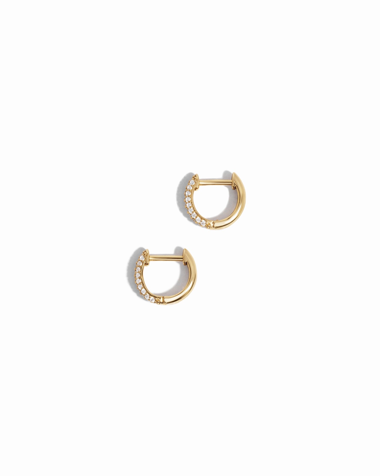 image of delicate earrings featuring a minimalist small hoop earring design 