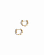 image of delicate earrings featuring a minimalist small hoop earring design 